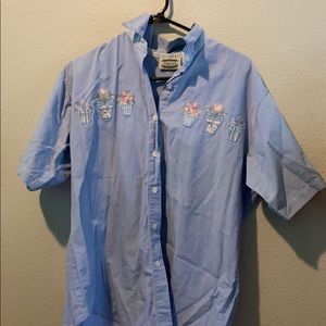 Light blue button down shirt embroidered flowers